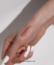 Fitglow Beauty-Lip Color Serum-Makeup-    LipColourSerum_handswatch_koi_02_DTC-The Detox Market | Koi - Peach Spice Nude