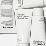 Nécessaire-The Body Exfoliator - Fragrance-Free-Body-03_NECESSAIRE_PDP_THEBODYEXFOLIATORFRAGRANCE-FREE_FLATLAY-The Detox Market | 
