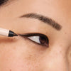 ILIA-Thru Line Waterproof Eyeliner-Makeup-ILIATHRULINEEYELINER_2026_MODEL_SERIF_MEDIUM_1500x2000_d259f145-1536-48c3-b258-f80e085ab35d-The Detox Market | Serif - Matte dark brown