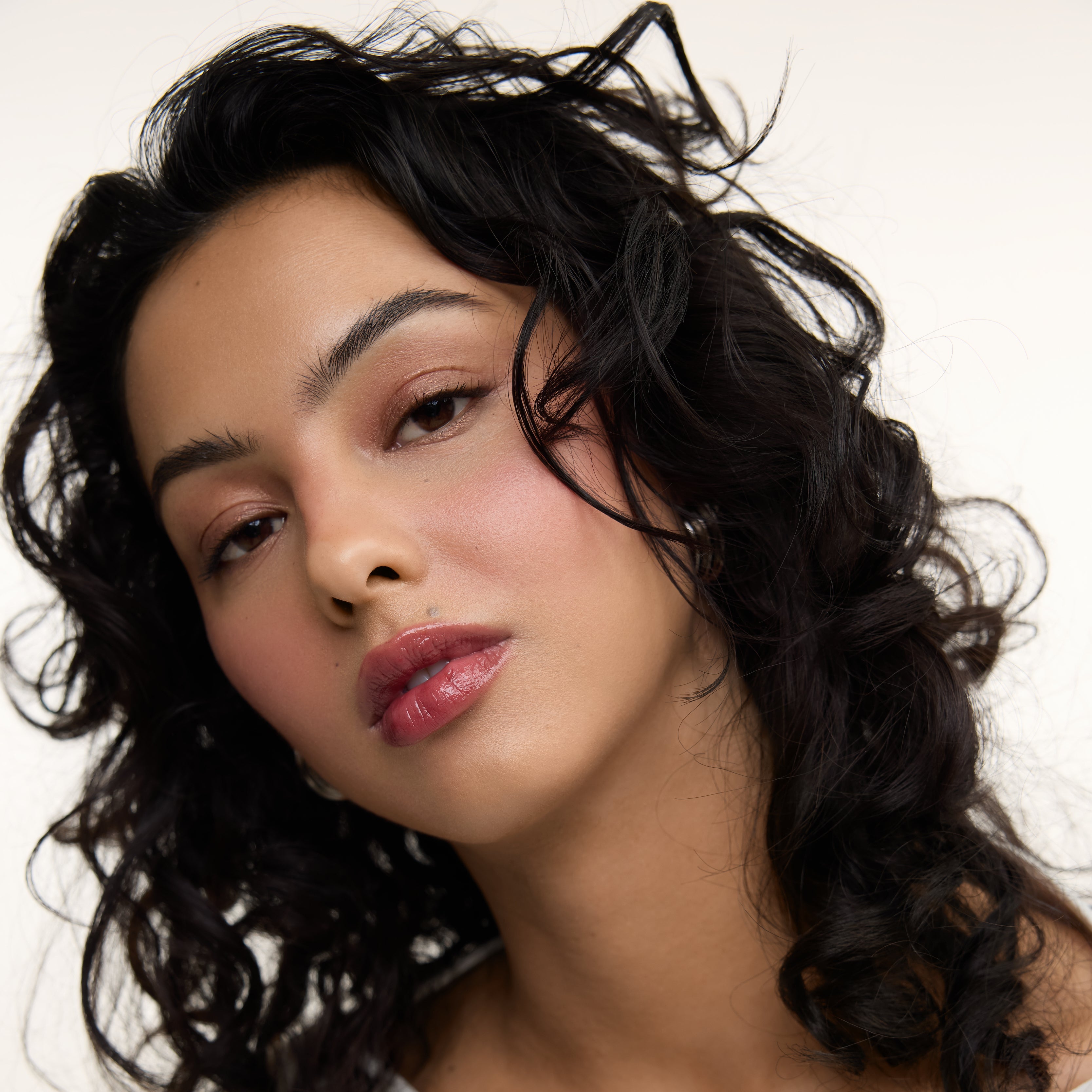 Wonderblush-La Laque Tinted Lip Oil-Makeup-LaLaque-ModelMediumSkin-Bordeaux-The Detox Market | Bordeaux - Deep berry