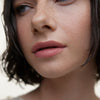 Wonderblush-Le Baume Tinted Lip Balm-Makeup-LeBaume-ModelLightSkin-Petale-The Detox Market | Petale - Petal Pink