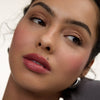 Wonderblush-Le Baume Tinted Lip Balm-Makeup-LeBaume-ModelMediumSkin-Petale_a7cbb418-61e0-47da-ba5d-df0f5b17f01d-The Detox Market | 