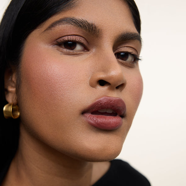 Wonderblush-Le Rouge Lipstick-Makeup-LeRouge-ModelDarkSkin-Cassis_09fa92ce-69de-495b-8f7c-66a93c02abbc-The Detox Market | Cassis - Muted wine