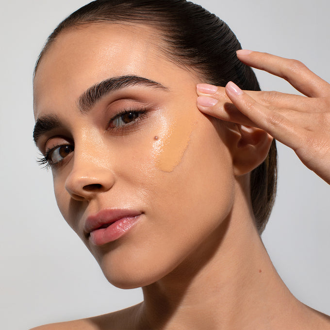 Odacite-Spf 50 Flex-Perfecting™ Mineral Drops Tinted Sunscreen-Sun Care-SPF50Tinted_model_02_swatch-The Detox Market | 02 - light medium with neutral undertones
