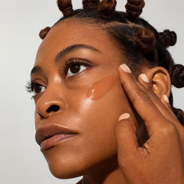 Odacite-Spf 50 Flex-Perfecting™ Mineral Drops Tinted Sunscreen-Sun Care-SPF50Tinted_model_04_swatch-The Detox Market | 04 - medium deep with golden undertones