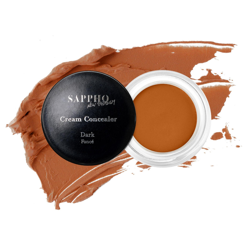 New Paradigm Concealer - Makeup - Sappho New Paradigm - Full_coverage_natural_concealer_for_Dark_skin_tone_open_jar_with_swatch_white_background - The Detox Market | Dark